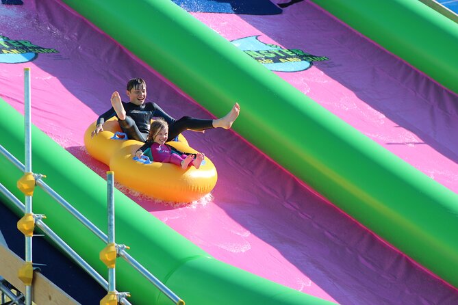 A monster 360ft long slip and slide session in BUDE, Cornwall - Gear up right: Bodyboards, rings, wetsuits, and grip socks