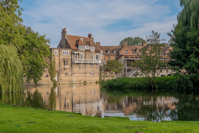 Cambridge University Colleges Guided Punting Tour - The Timbers-Into-an-Arch Bridge Moment and a Gothic College Facade