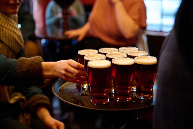 Devour London Historical Pub Tour:Traditional British Food & Ales - Stop 2: The Old Bell Tavern near Covent Garden, sausage rolls and cider