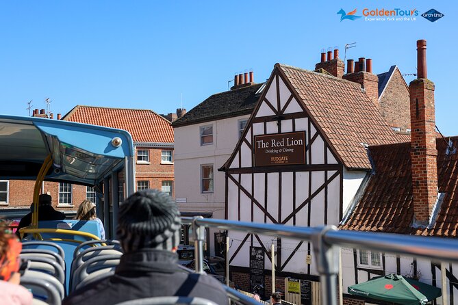 Golden Tours York Hop-on Hop-off Open Top Bus Tour with Audio Guide - Audio guide details that turn street views into stories