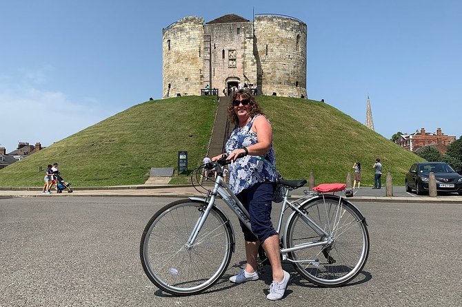 Guided Bike Tour in York - St William’s College and the York Minster east window