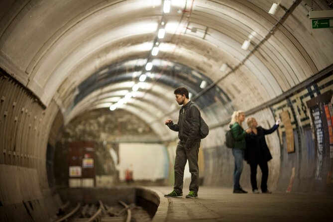 Hidden Tube Walking Tour of Aldwych Disused Station - The physical reality: stairs, low light, and tight spaces