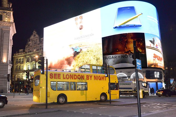 London by Night Sightseeing Tour - Open Top Bus - Tower Bridge and the London Eye, when the Thames turns into a photo backdrop
