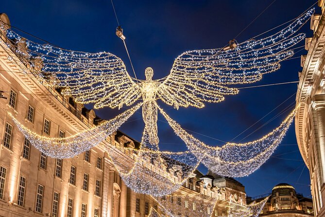 Magical London Christmas Lights Walking Tour with a Londoner - Leicester Square: holiday lights plus a busy market scene