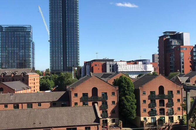 Manchester Private Tour with a Local - Highlights & Hidden Gems - A restored Victorian market hall: sit down, reset, and get local tips