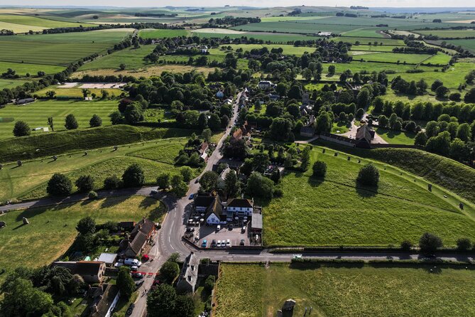 Oxford and Cotswolds Tour with Country Pub Lunch from London - Burford and Bibury: Woolsack tombs, Arlington Row, and stone cottages that photograph well