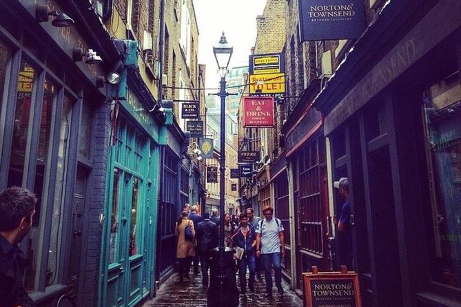 PRIVATE Jack the Ripper Ghost Walking Tour in London - Old Spitalfields Market: conspiracy talk and the first hook into Whitechapel