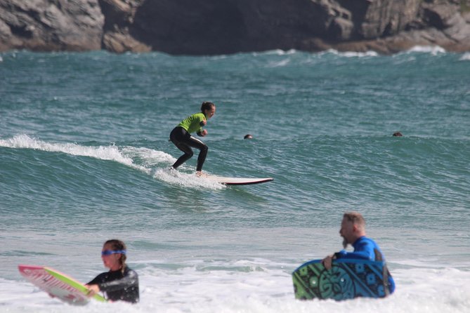 Private One on One Surf Lesson in Newquay, for Beginners / Novice Surfers - Newquay Beach in the water: applying the basics to real waves