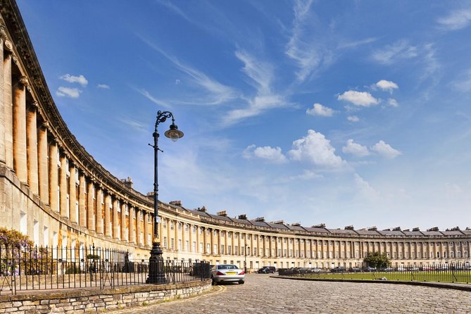 Small Group Cotswolds Village, Stonehenge and Bath Tour from London - Bath’s highlights: Pulteney Bridge, Bath Abbey, and Royal Crescent